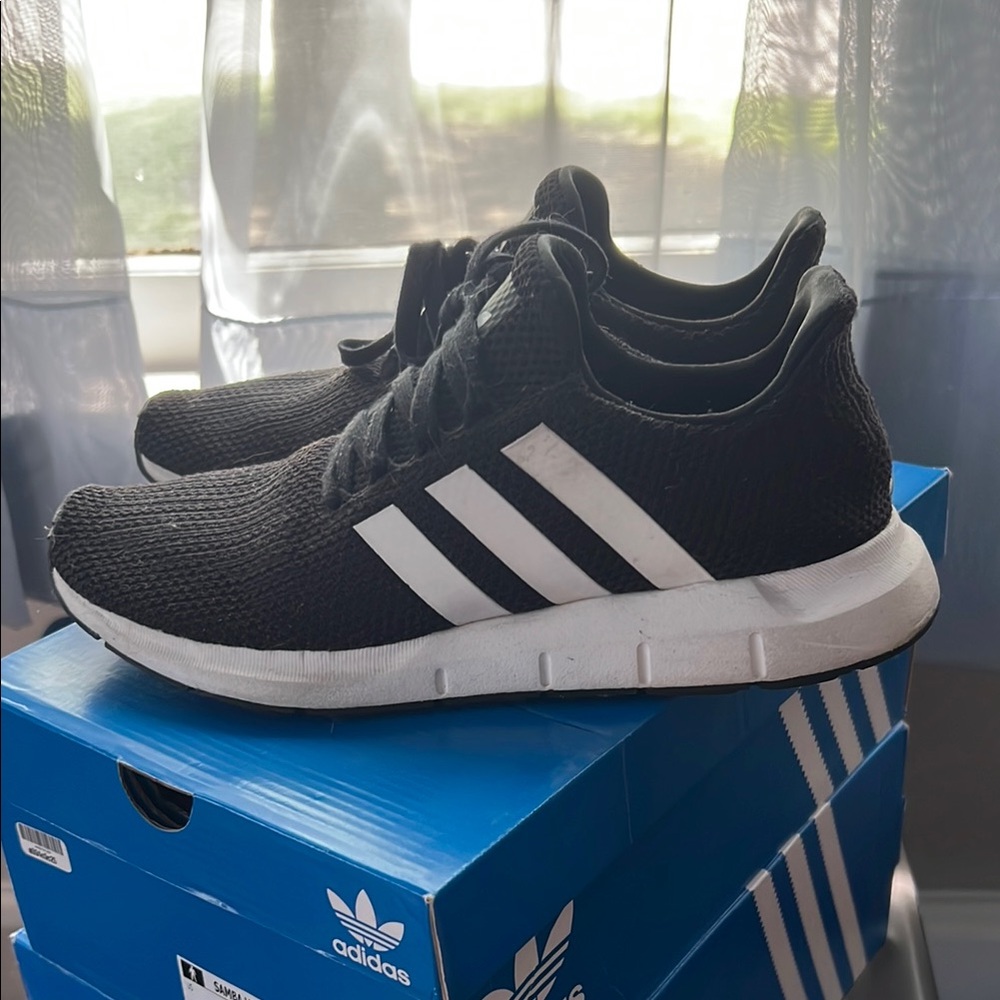 Adidas Black and White Sneakers with Sleek Athletic Design